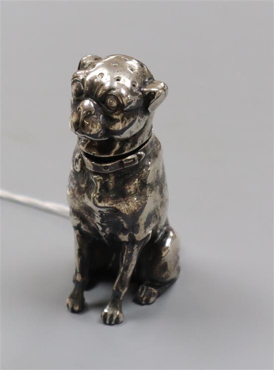 A sterling novelty seated dog pepperette, 72mm.